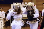 日本拳法第28回東日本大学リーグ戦
女子リーグ　赤：立教大学・小池vs中央大学・糸井。小池の面突き（一本）。