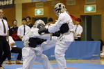 矢野杯争奪日本拳法第29回東日本学生個人選手権大会
級の部、立正大学・室井vs中央大学・國分。國分の胴突き（一本）。<br>撮影：Inno